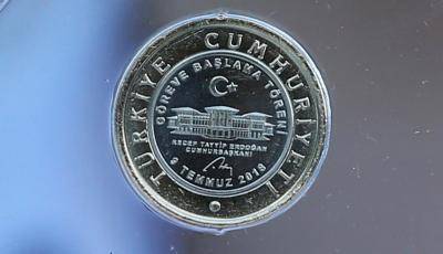 A special one lira coin minted for the presidential inauguration of Recep Tayyip Erdogan. Photo: Getty Images.