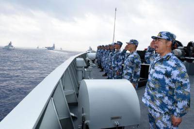 A PLA Navy fleet takes part in a review in the South China Sea. Photo: Getty Images.