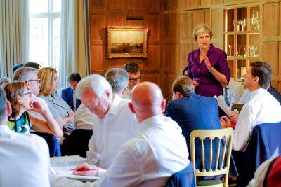 Theresa May speaks to her cabinet at Chequers on 6 July. Photo: Getty Images.