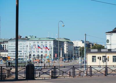 American and Russian flags in Helsinki on 16 July. Photo: Getty Images.
