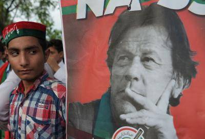 Supporters gather near the home of Imran Khan on 26 July. Photo: Getty Images.