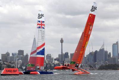 Sailing teams from Britain and China compete in a race in Sydney, Australia. Photo: Getty Images.