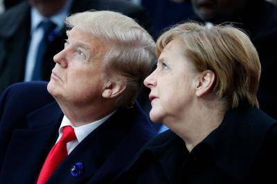 Donald Trump and Angela Merkel at the commemorations marking the 100th anniversary of the 11 November 1918 armistice, ending the First World War. Photo: Getty Images.
