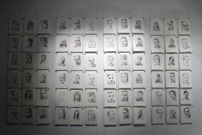 Portraits by '3 Robots Named Paul' - an art installation by Patrick Tresset which uses robots to sketch human models. Photo: Getty Images.