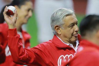 Mexican president Andrés Manuel López Obrador throws out the first pitch at a baseball game in March. Photo: Getty Images.