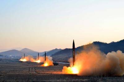 This undated photo released by North Korea's news agency in March 2017 shows the launch of four ballistic missiles during a military drill at an undisclosed location in North Korea. Photo: STR/AFP/Getty Images.