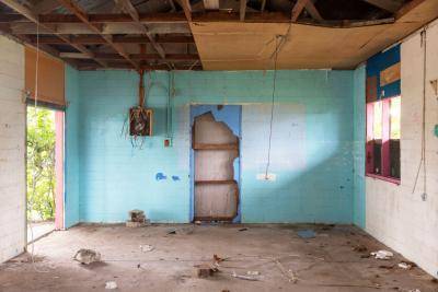 A room where refugees were once housed on Manus Island, Papua New Guinea. Photo: Getty Images.