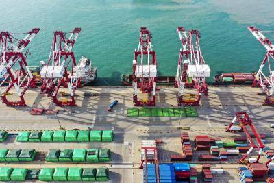 Aerial view of containers sitting stacked at Qingdao Port in the Shandong province of China. Photo by Han Jiajun/Visual China Group via Getty Images.