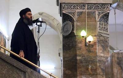 An image grab from a video released in 2014 shows Abu Bakr al-Baghdadi preaching at a mosque in Mosul. Photo by Al-Furqan Media/Anadolu Agency/Getty Images