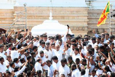 Sri Lanka's President-elect Gotabaya Rajapaksa arrives to take the oath of office at the Ruwanwelisaya temple in Anuradhapura on 18 November. Photo: Getty Images.