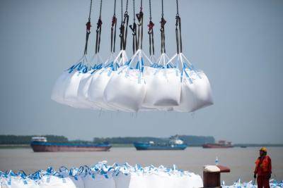 Unloading at a port in Zhangjiagang. Photo: Getty Images.