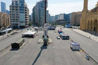 An aerial view shows the Lebanese capital Beirut's Martyrs Square that was until recent months the gathering place of anti-government demonstrators, almost deserted during the novel coronavirus crisis, on 26 March 2020. Photo by -/AFP via Getty Images.