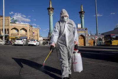 Spraying disinfectant at Tajrish bazaar in Tehran, Iran, during the coronavirus pandemic in March 2020. Photo by Majid Saeedi/Getty Images.