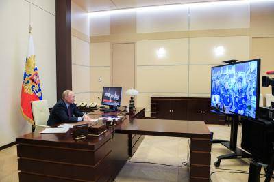 Russia's President, Vladimir Putin, during a video link with cosmonauts on the International Space Station (ISS). Photo: Getty Images.