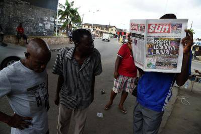 News stand in Lagos, Nigeria on April 12, 2020. Photo by PIUS UTOMI EKPEI/AFP via Getty Images.