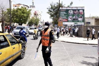 Dakar after the Interior Ministry announced compulsory wearing of masks in public and private services, shops and transport, under penalty of sanctions. Photo by SEYLLOU/AFP via Getty Images.