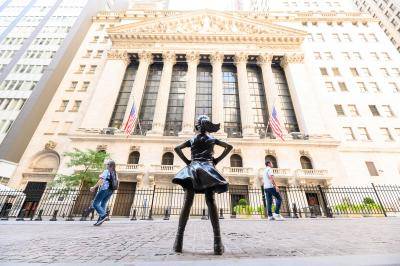 Fearless Girl statue outside the New York Stock Exchange. Photo by Noam Galai/Getty Images.