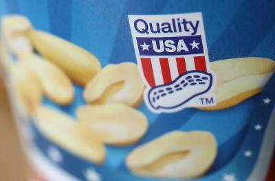 Photo illustration of the seal on a jar of American peanut butter in a German supermarket. Photo by Sean Gallup/Getty Images.