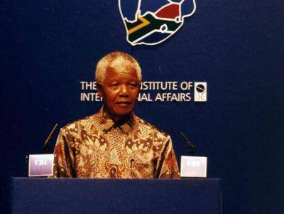 President Nelson Mandela of South Africa addresses an audience at an event co-hosted by Chatham House, the CBI and COSAT on July 10, 1996.