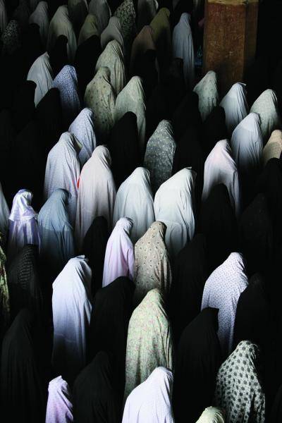 Iranian women perform their Friday prayer at the Imam mosque in the </body></html>