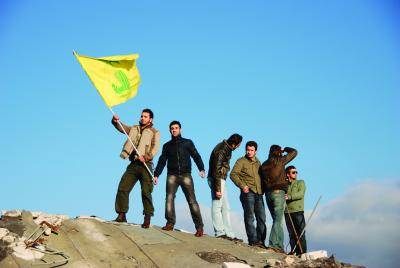 Waiving a Hezbollah flag o</body></html>