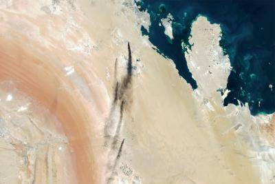 Smoke from smouldering Saudi oil plants is seen in this satellite image
